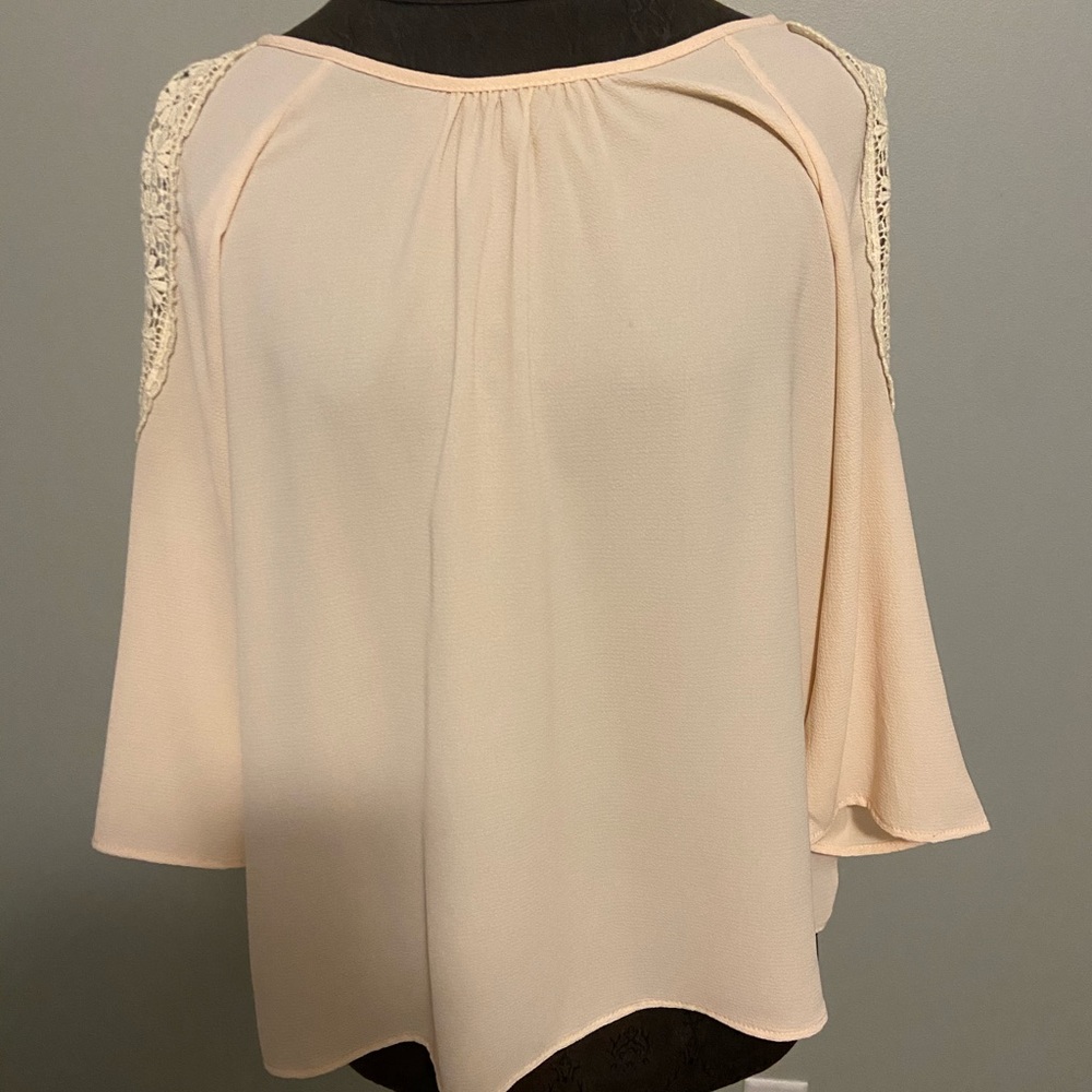 Pale pink open shoulder shirt